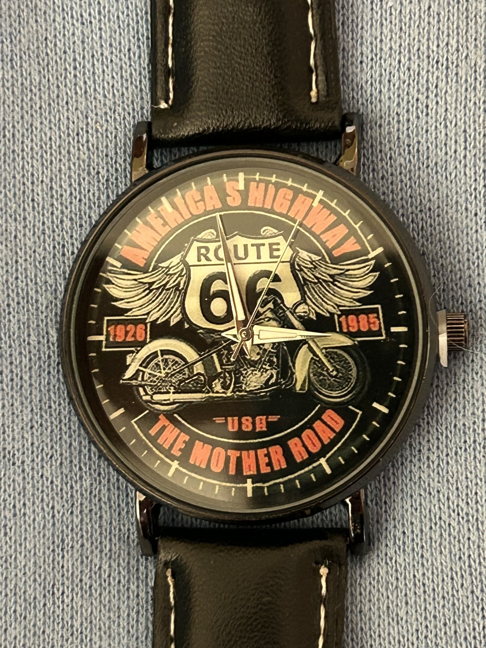 Route 66 Motorcycle Graphic Wristwatch - Black with Orange and Cream Accents.
